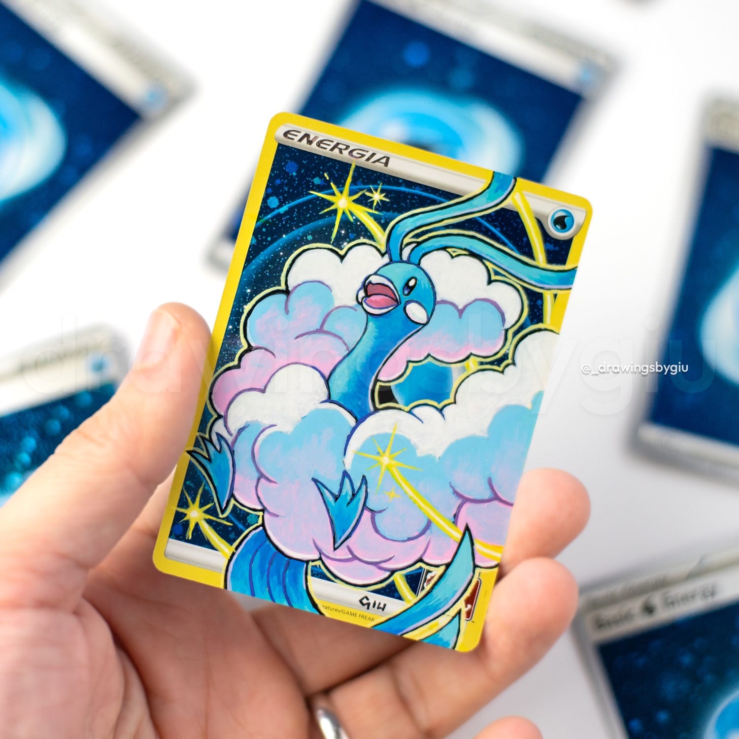 Hand-painted Altaria on Pokémon card by Giu Magnani.