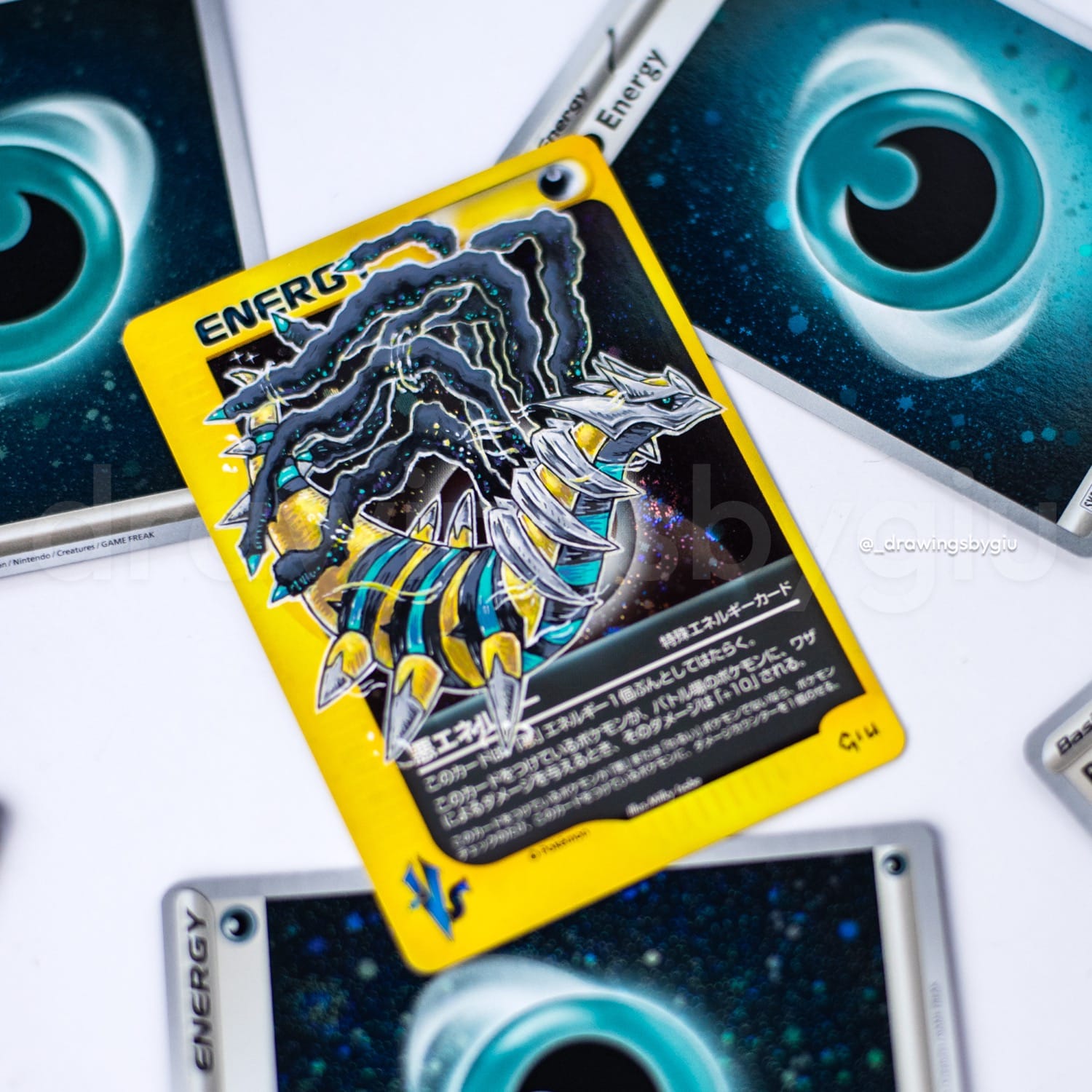 Hand-painted Shiny Giratina on Pokémon card by Giu Magnani.