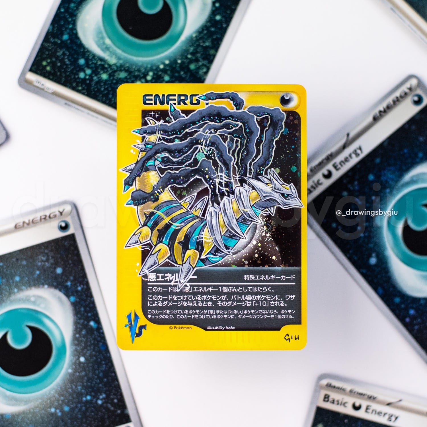 Hand-painted Shiny Giratina on Pokémon card by Giu Magnani.