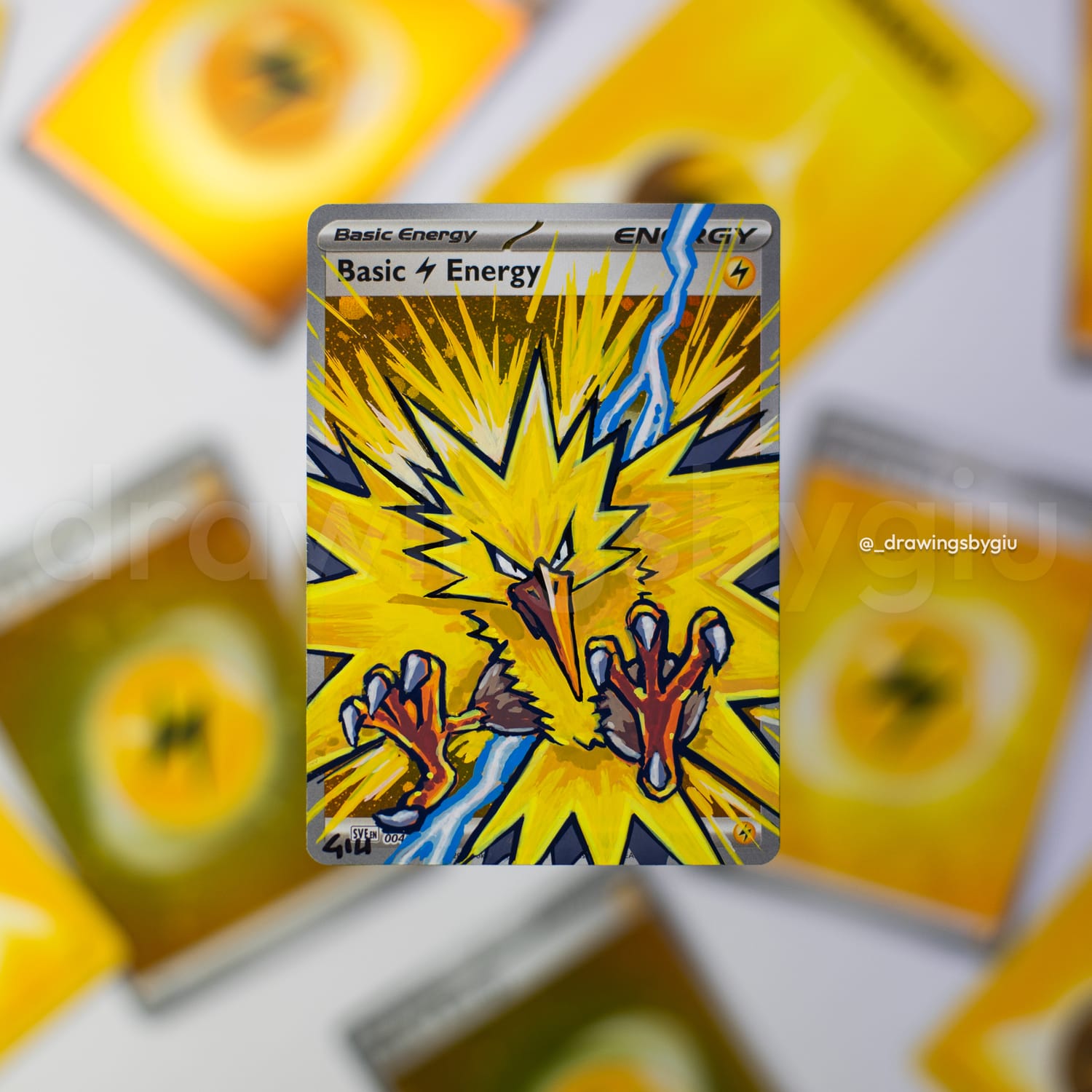 Hand-painted Zapdos on Pokémon card by Giu Magnani.