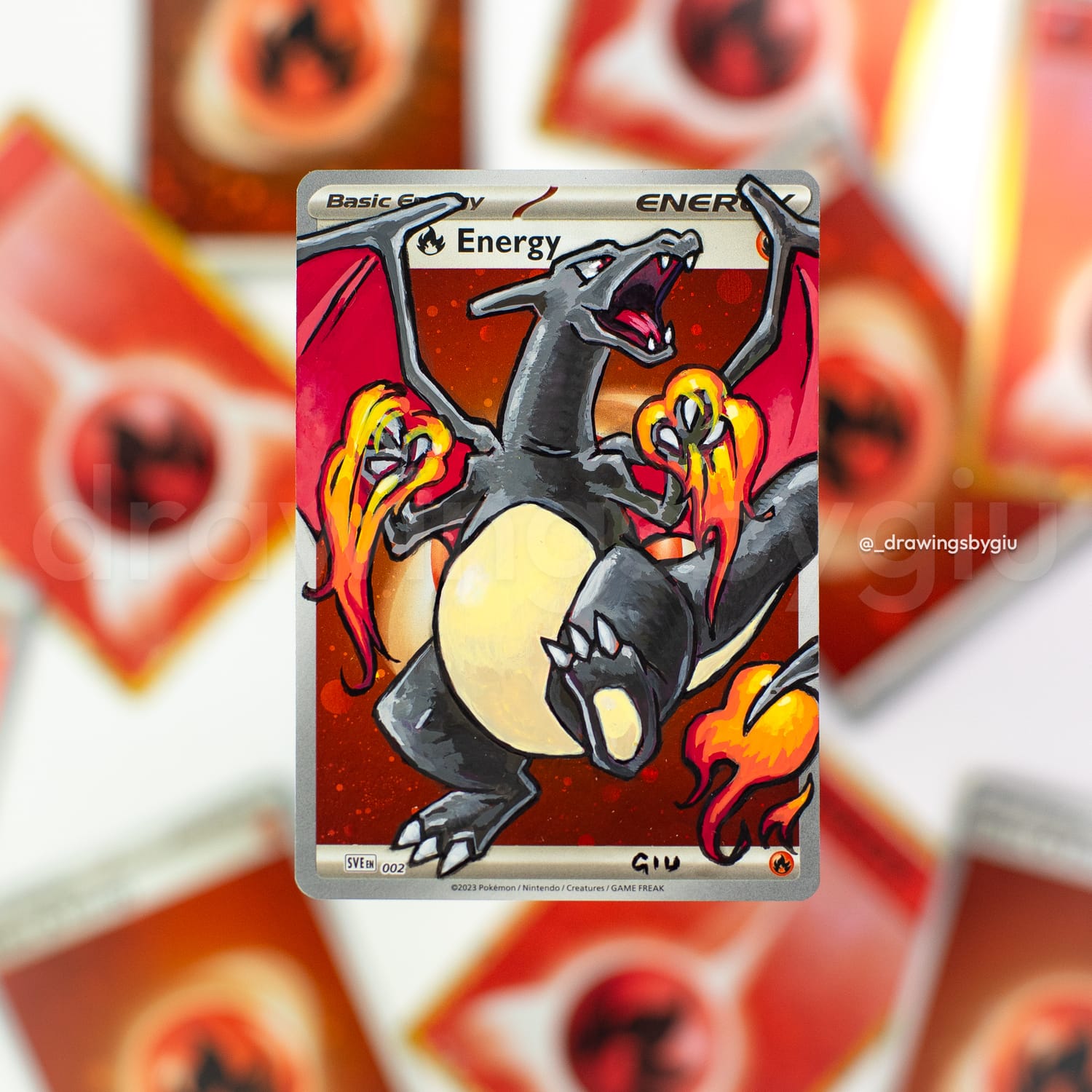 Hand-painted Shiny Charizard on Pokémon card by Giu Magnani.