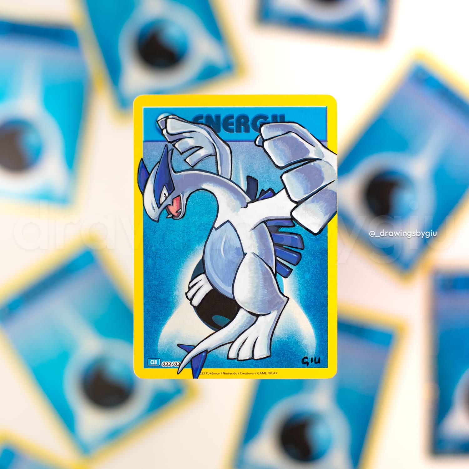 Hand-painted Lugia on Pokémon card by Giu Magnani.