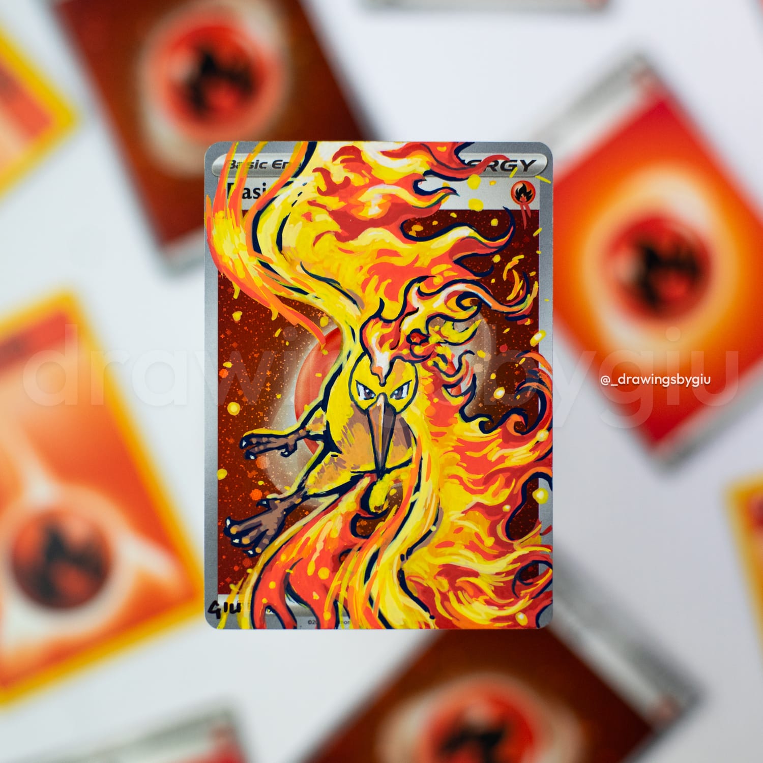 Hand-painted Moltres on Pokémon card by Giu Magnani.