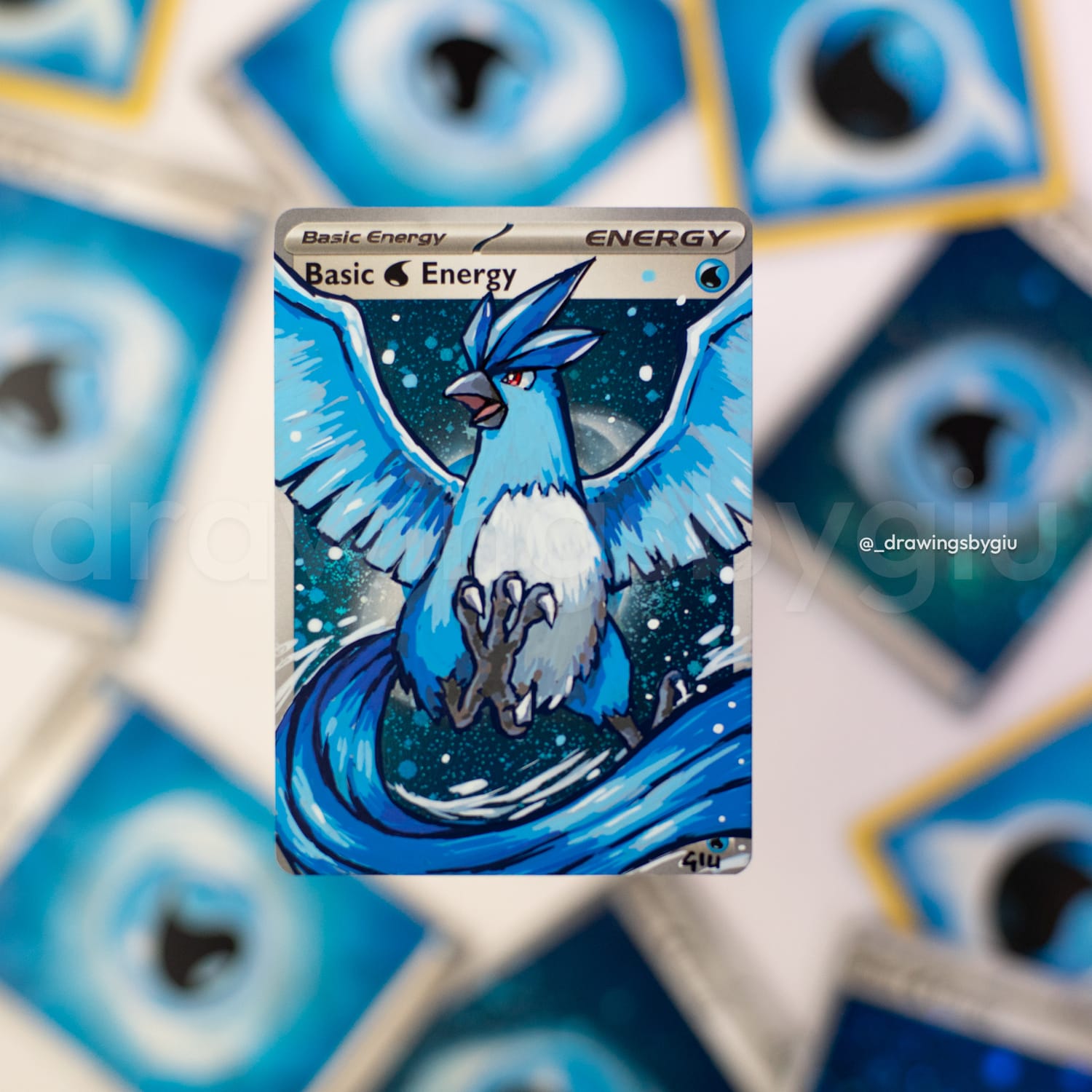 Hand-painted Articuno on Pokémon card by Giu Magnani.