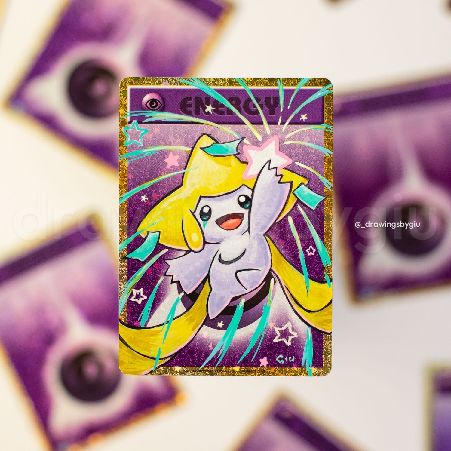 Hand-painted Jirachi II on Pokémon card by Giu Magnani.