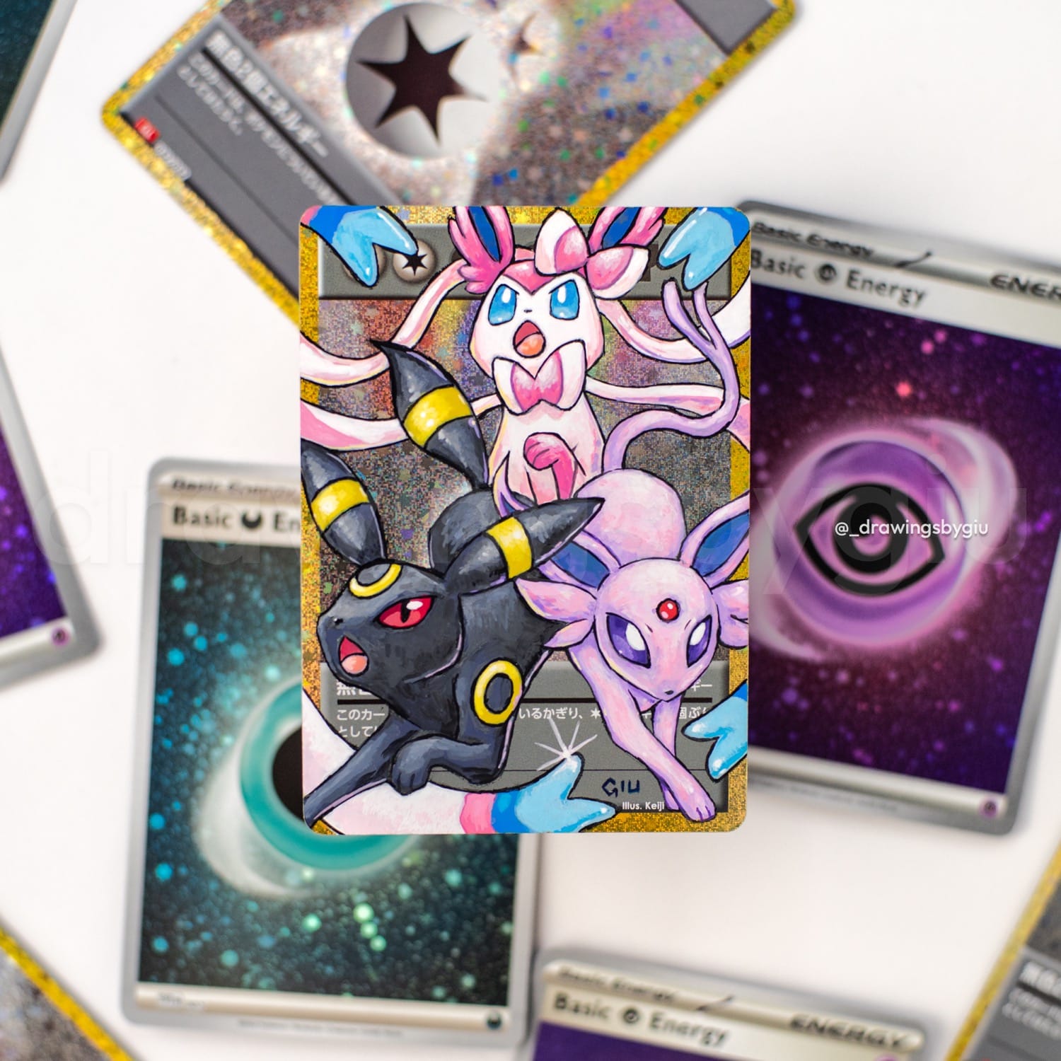 Hand-painted Sylveon, Umbreon & Espeon on Pokémon card by Giu Magnani.