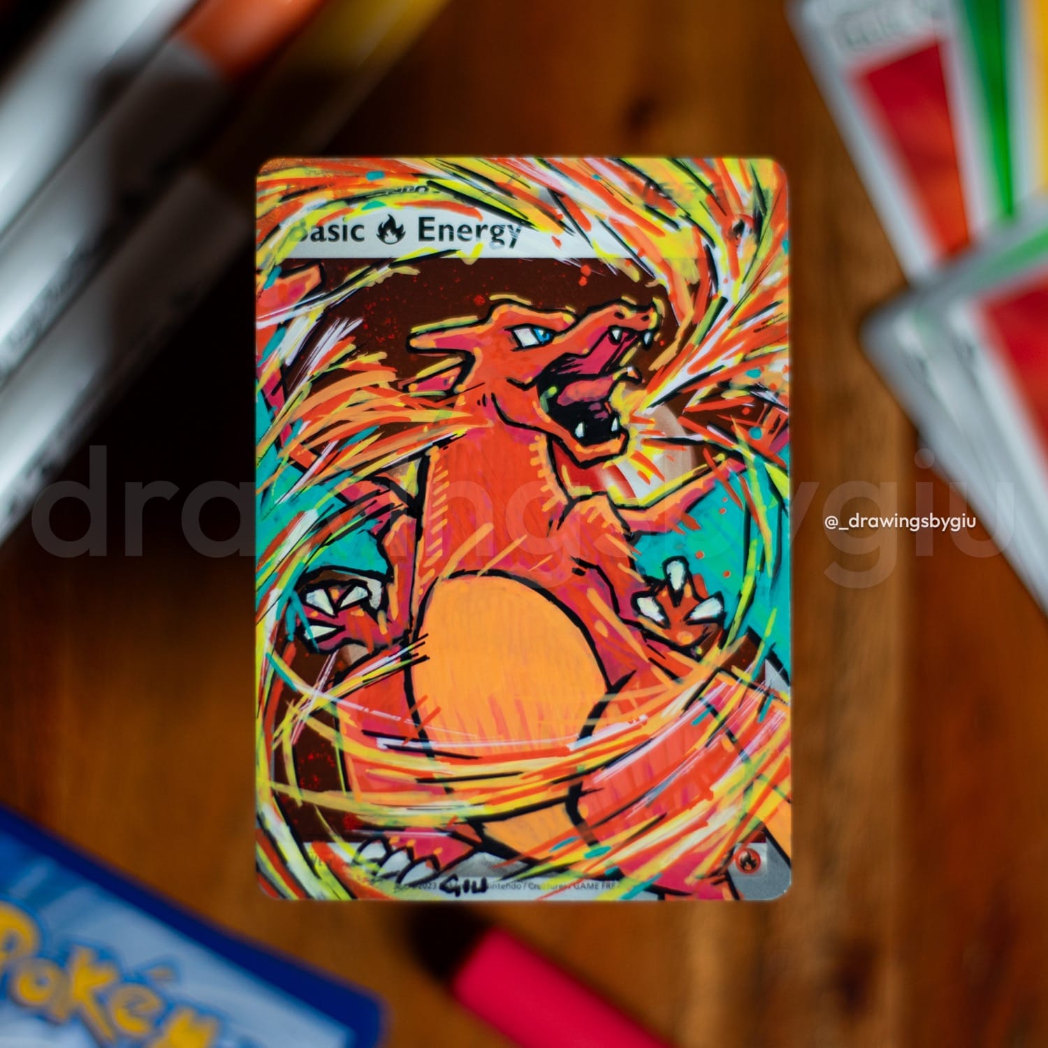 Hand-painted Charizard on Pokémon card by Giu Magnani.