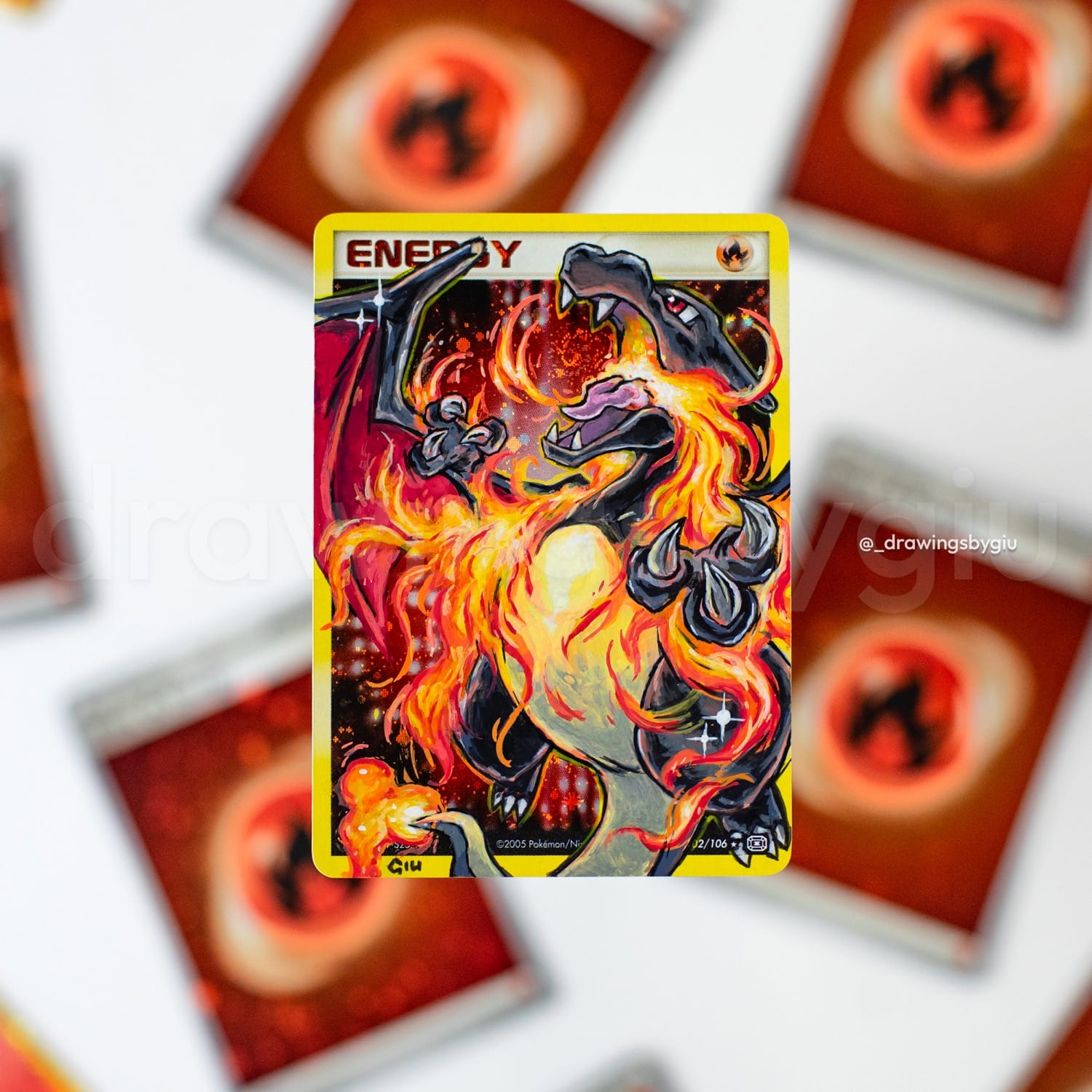 Hand-painted Shiny Charizard on Pokémon card by Giu Magnani.