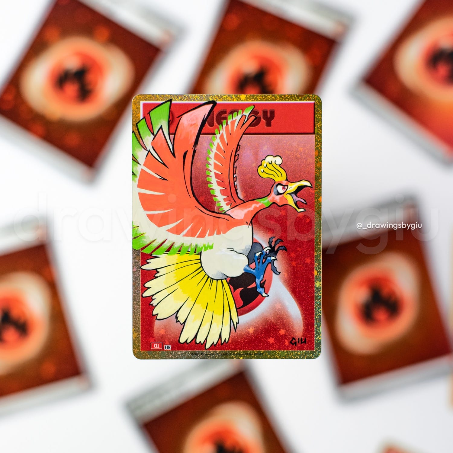 Hand-painted Ho-Oh on Pokémon card by Giu Magnani.