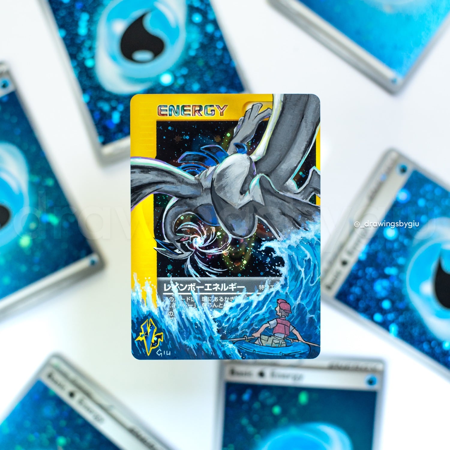 Hand-painted Lugia Silver Tempest on Pokémon card by Giu Magnani.