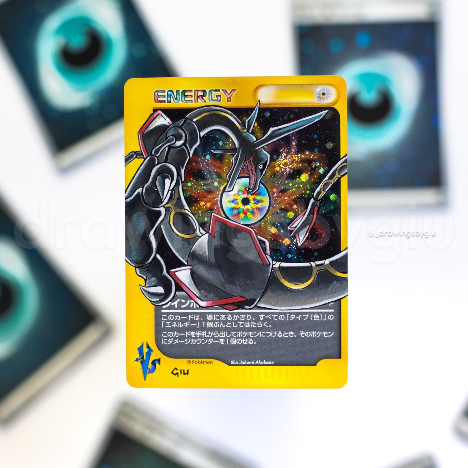 Hand-painted Gold Star Rayquaza on Pokémon card by Giu Magnani.