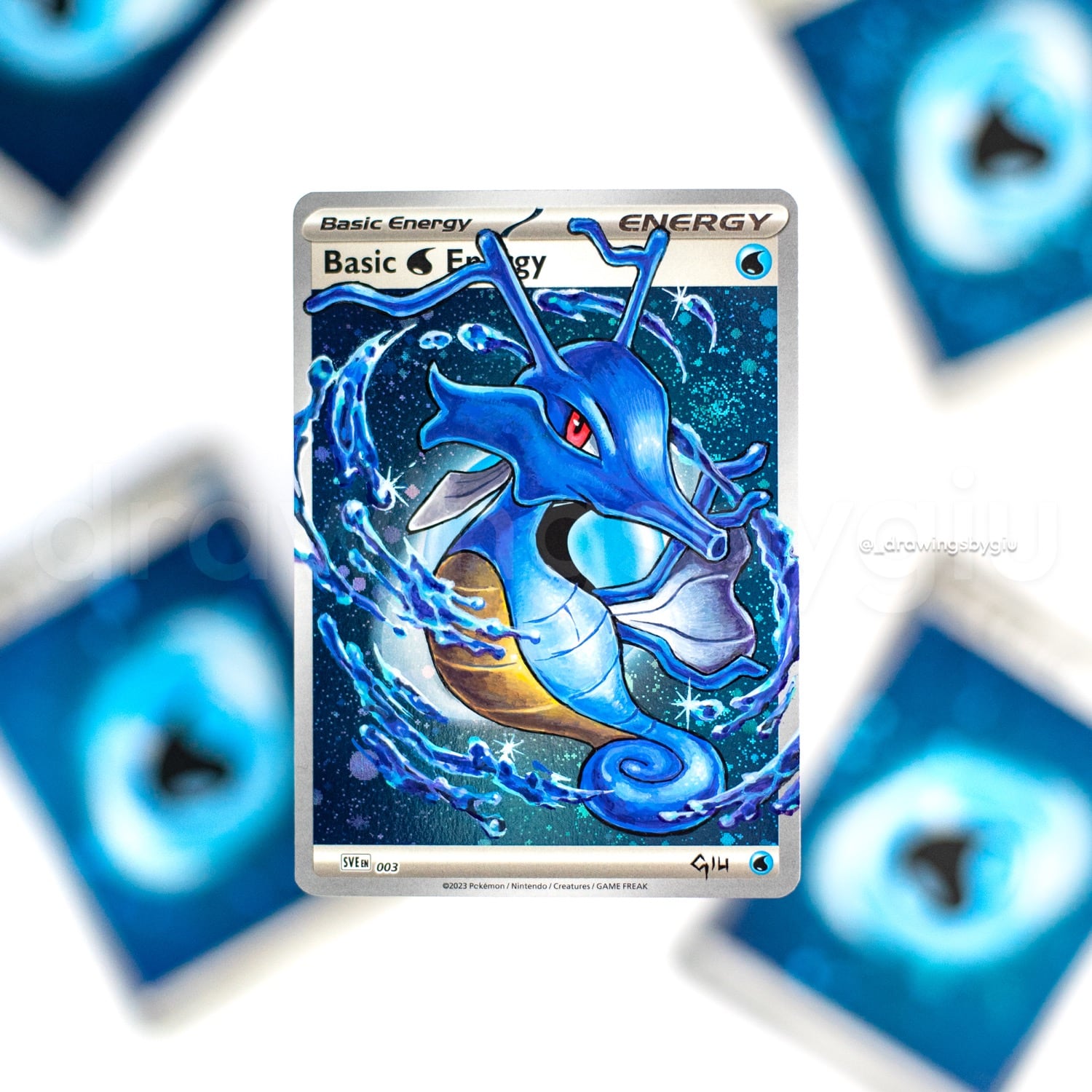 Hand-painted Kingdra on Pokémon card by Giu Magnani.